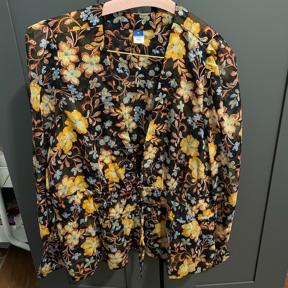 Flower patterned blouse.
